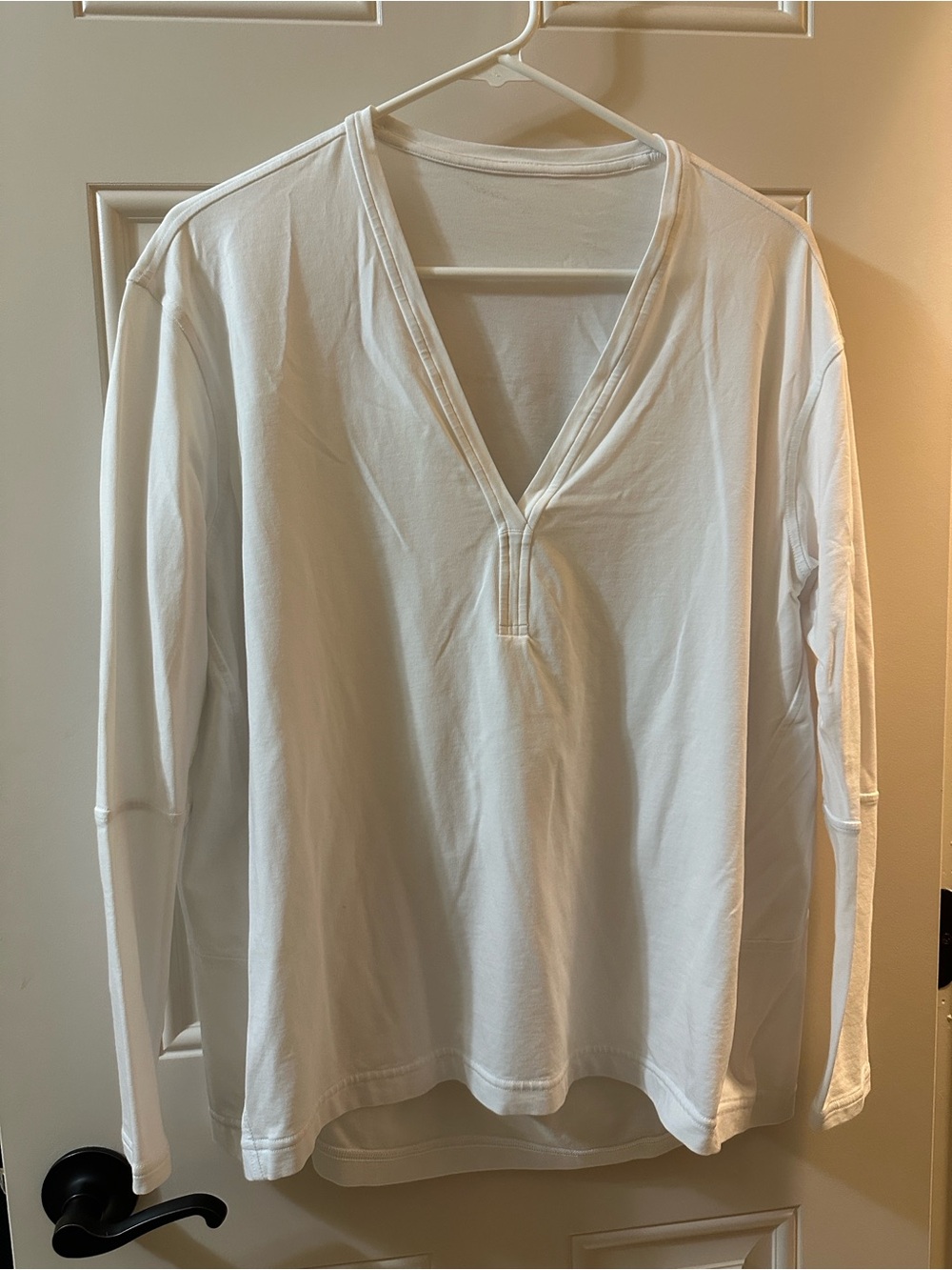 Back in action long sleeve v neck